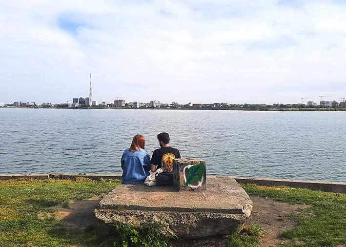 Bucharest Romania Insula Ingerilor Lake Dambovita Lacul Morii Angels Island bench couple